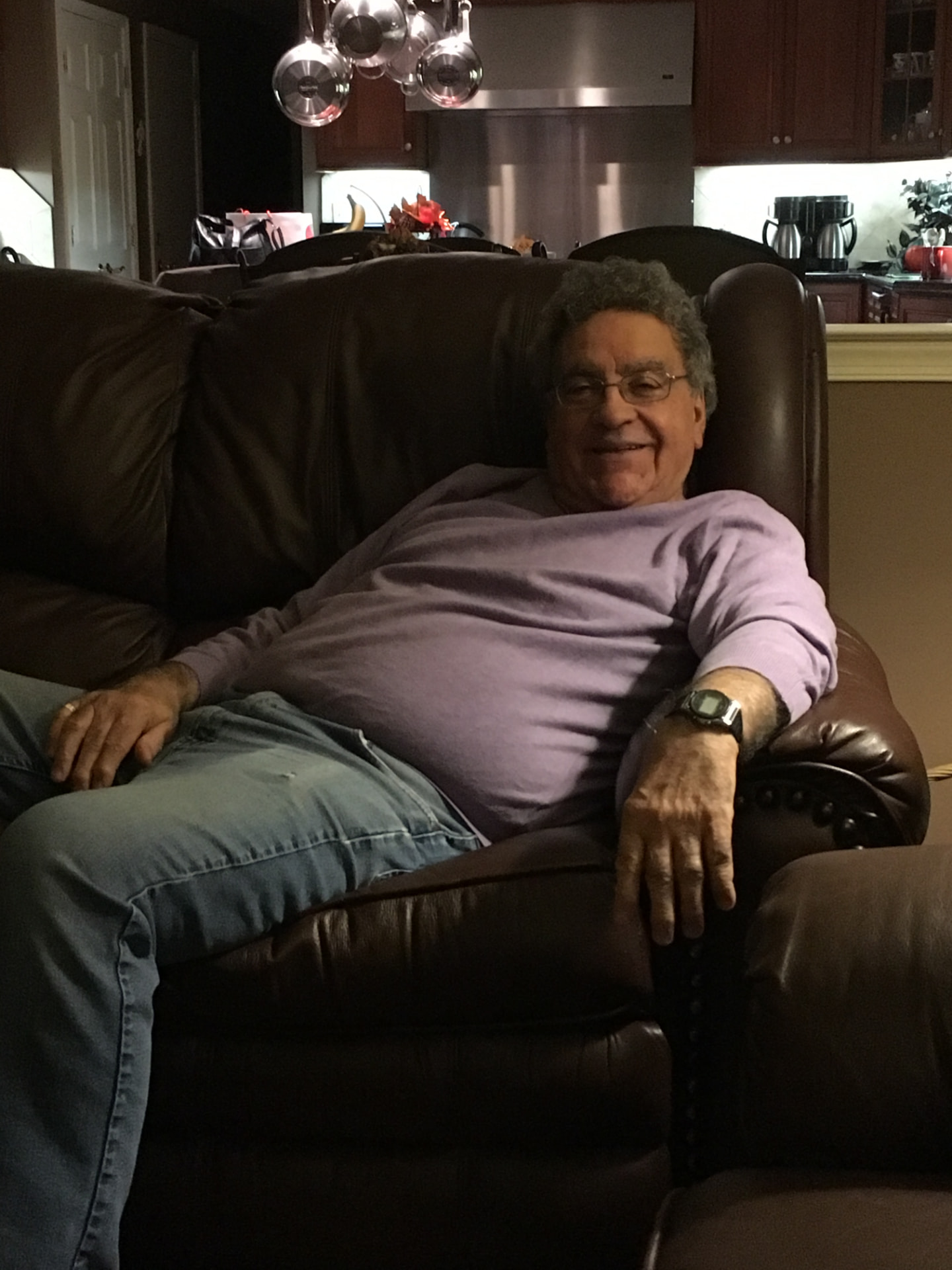 Charles relaxing at home