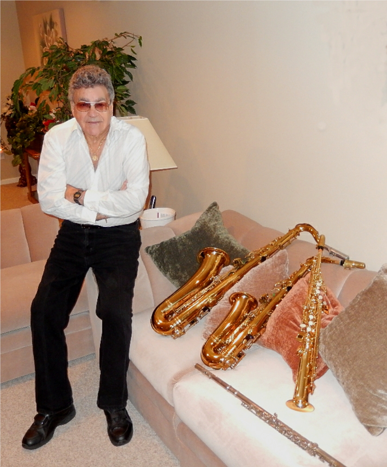 Charles at home with his saxophones and flute